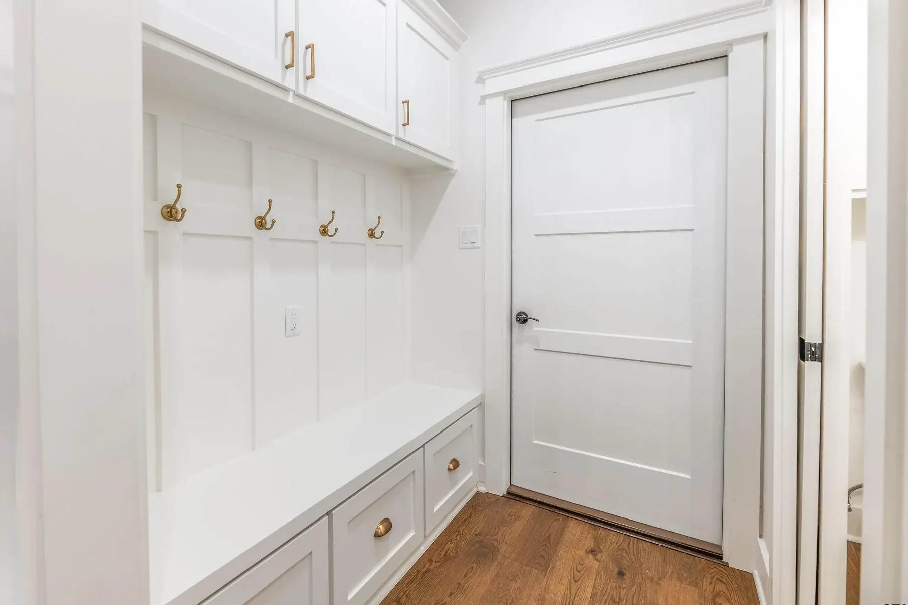 In our new house we have only a few cabinets in the kitchen so we moved the diapers to our mudroom. The mudroom bench also serves as a nice diaper changing station if it's cleared off, ha ha!